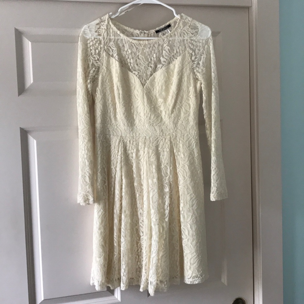 Janelle James White lace dress